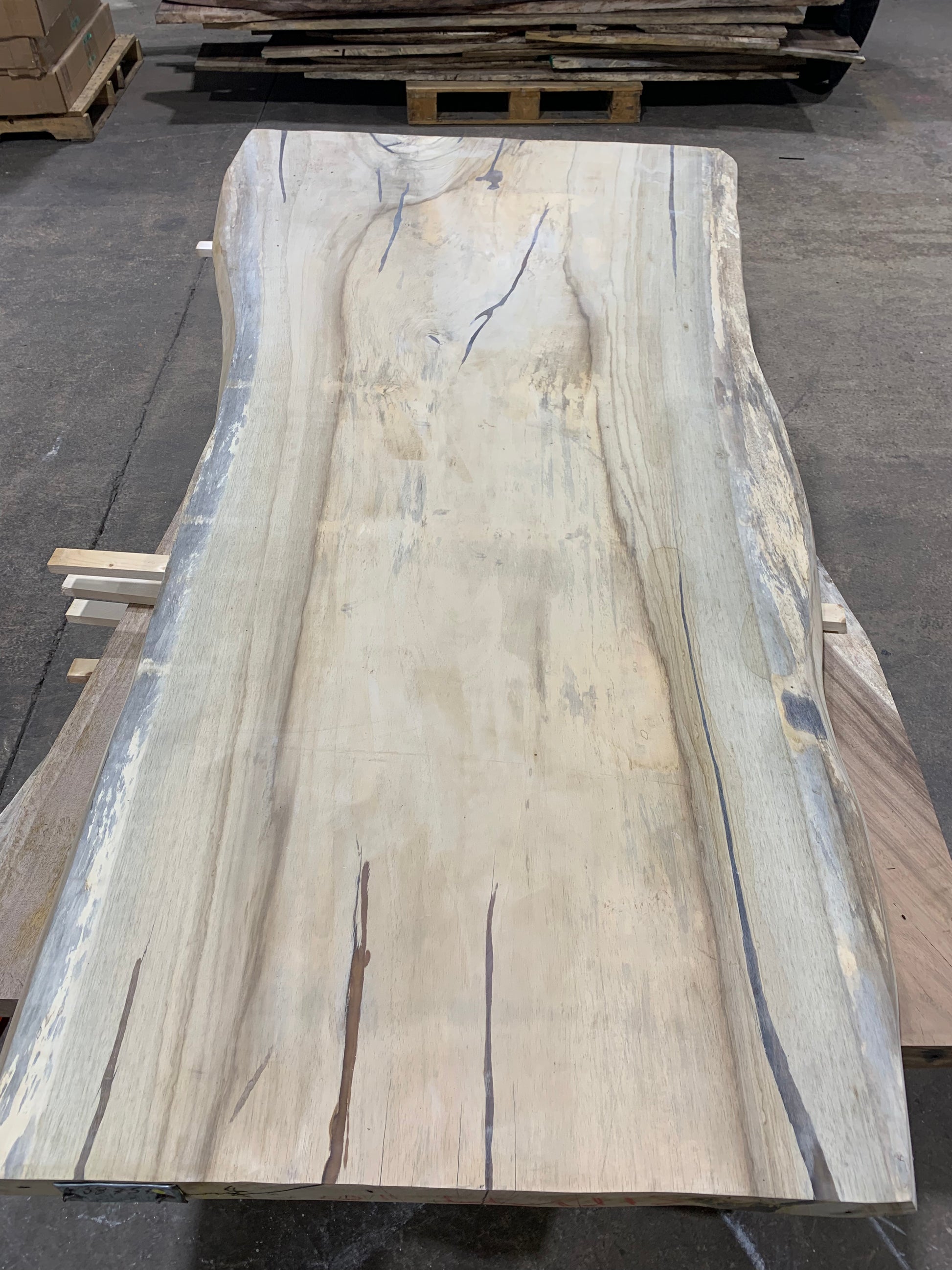 Custom Live Edge Dining Tables for Interior Design and Home Decor accented with rustic slab Coffee/End table furniture.